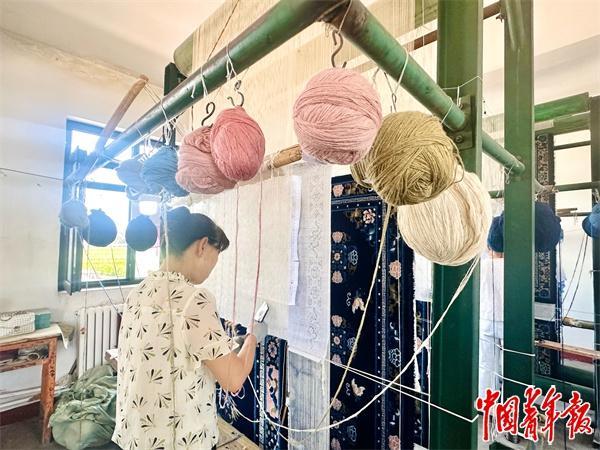 宁夏手工毯：600年非遗“织”就国际范儿